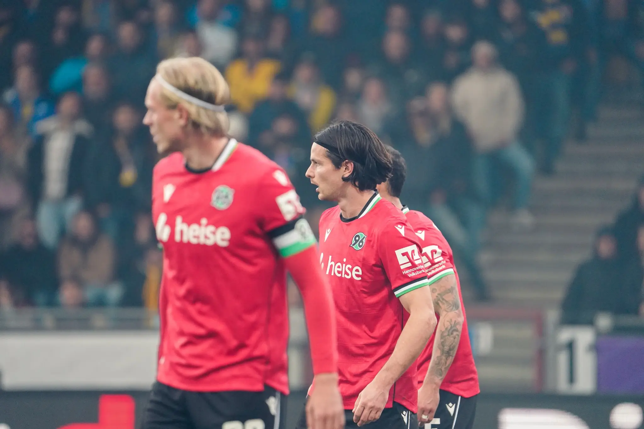 Hannover 96 players walk away after the derby defeat.