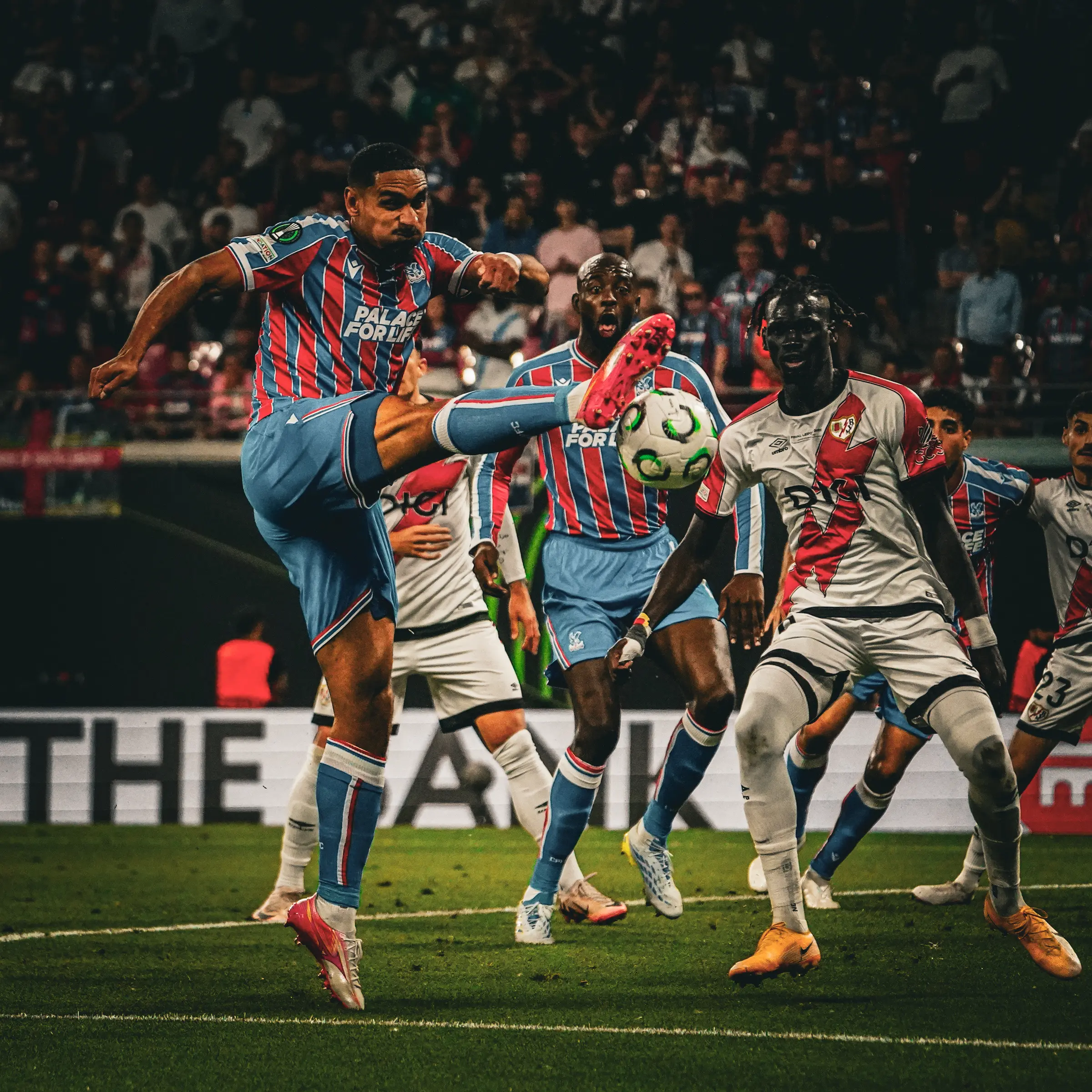 Crystal Palace and Rayo Vallecano contest the ball during the final in Leipzig.