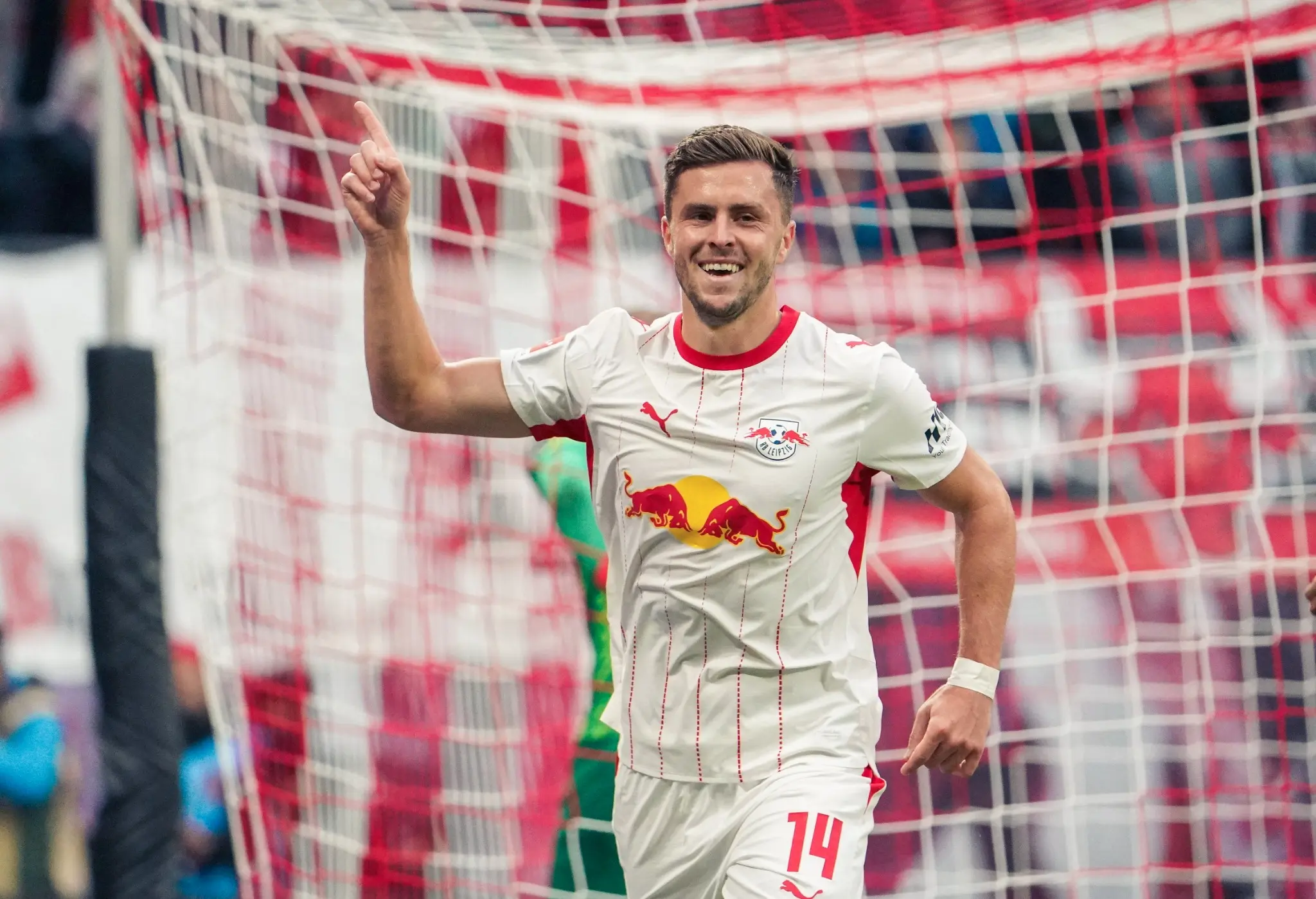 Christoph Baumgartner celebrates after scoring RB Leipzig's third goal against SV Elversberg.