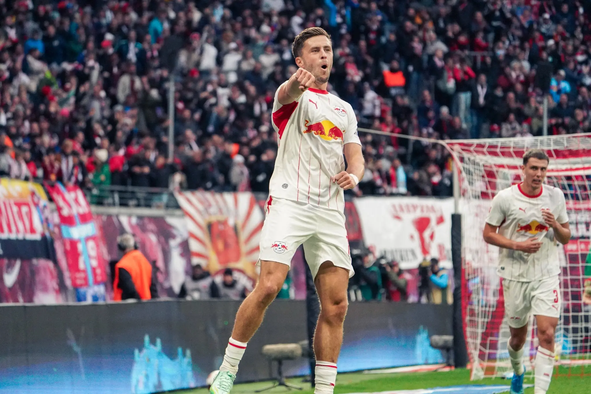 RB Leipzig players celebrate during the 4:0 Bundesliga victory over SV Elversberg at the Red Bull Arena.