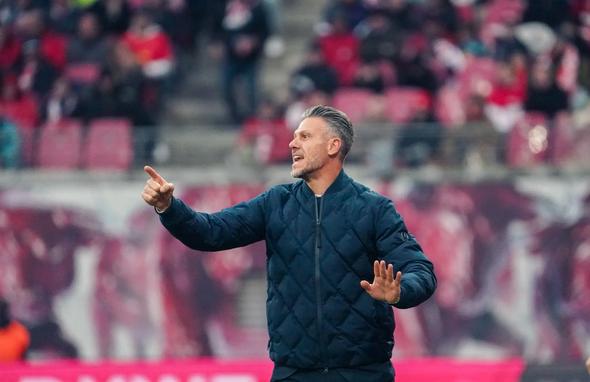 RB Leipzig head coach Martín Demichelis gives instructions from the touchline against SV Elversberg.