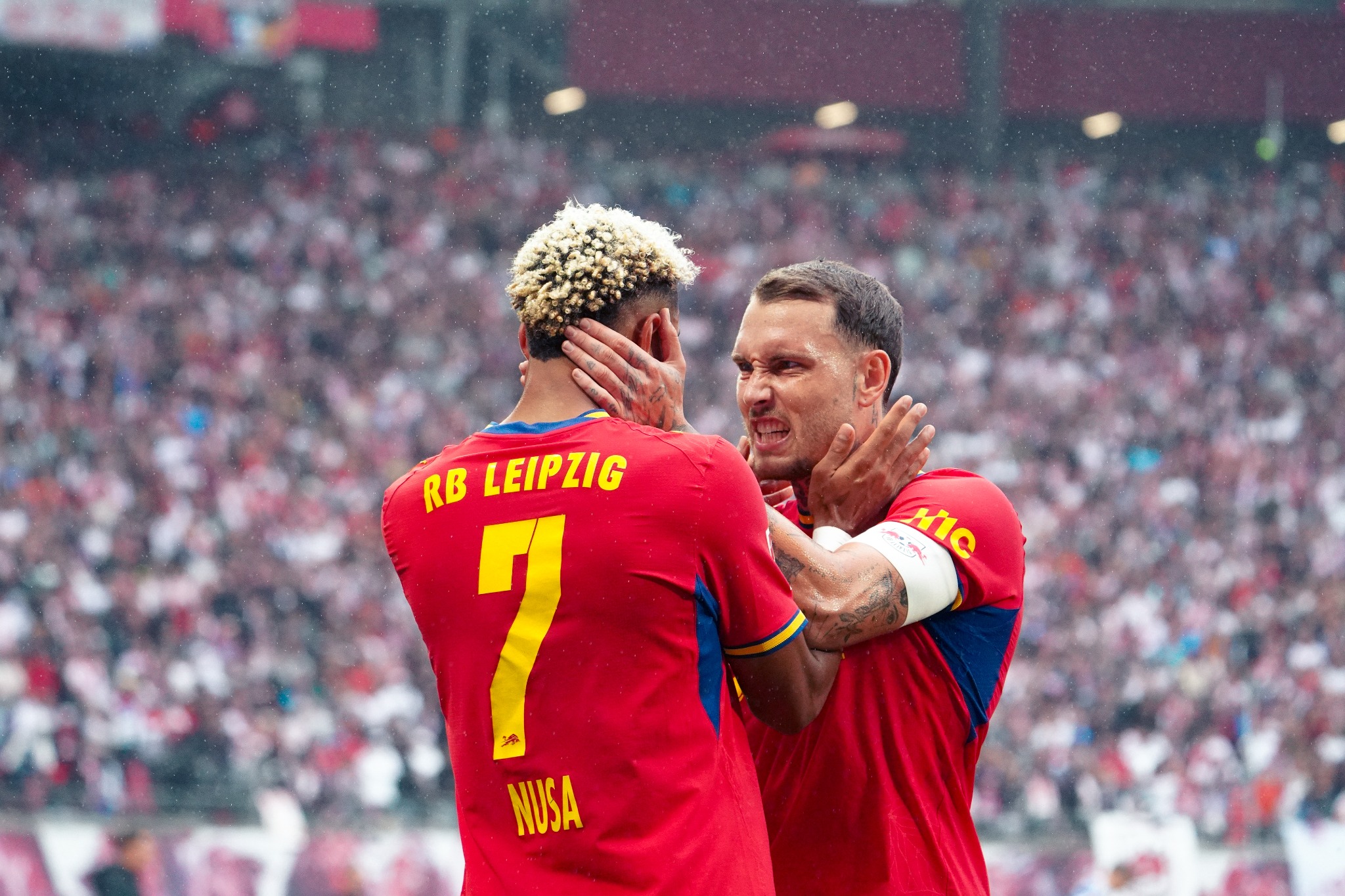 Antonio Nusa and Willi Orbán celebrate for RB Leipzig against Hamburger SV.