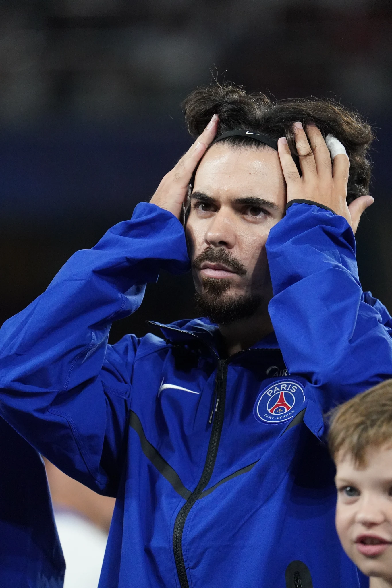A Paris Saint-Germain player in the pre-match line-up.
