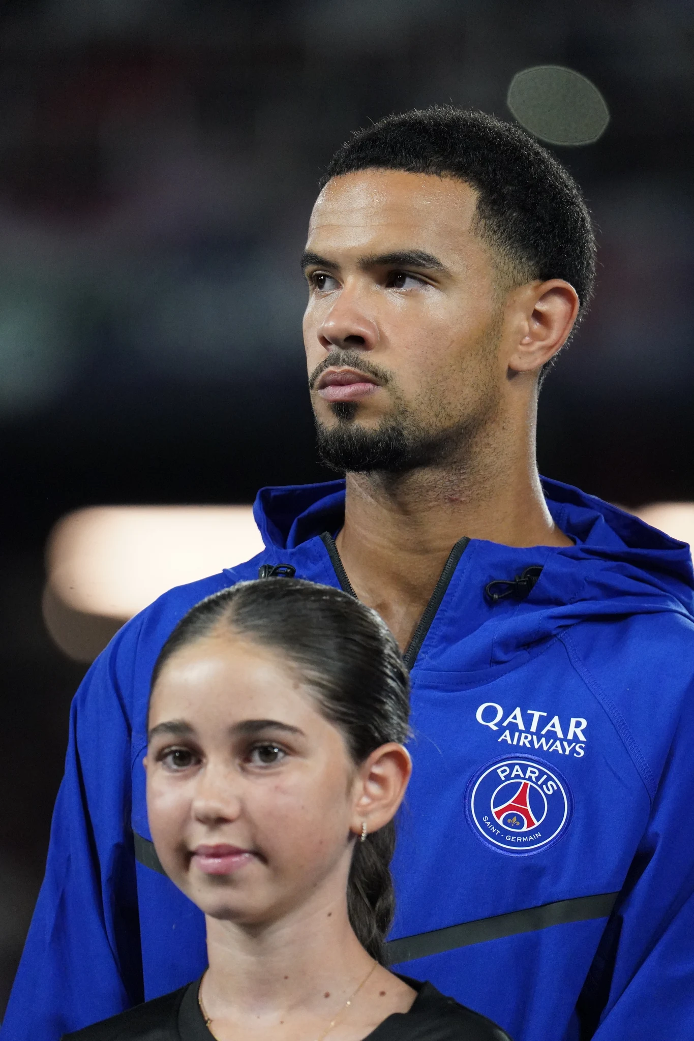 A Paris Saint-Germain player in the pre-match line-up.
