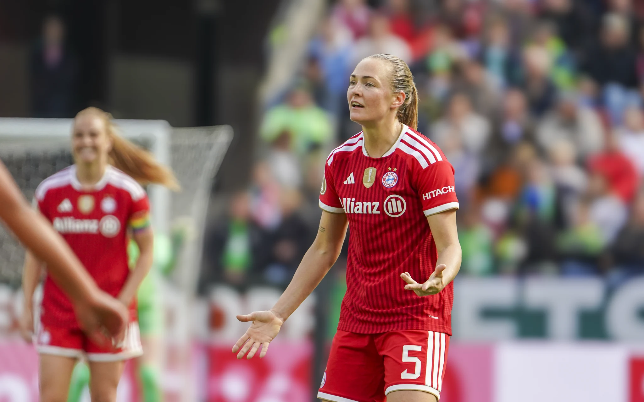 A Bayern Munich player gestures to her teammates during the final.