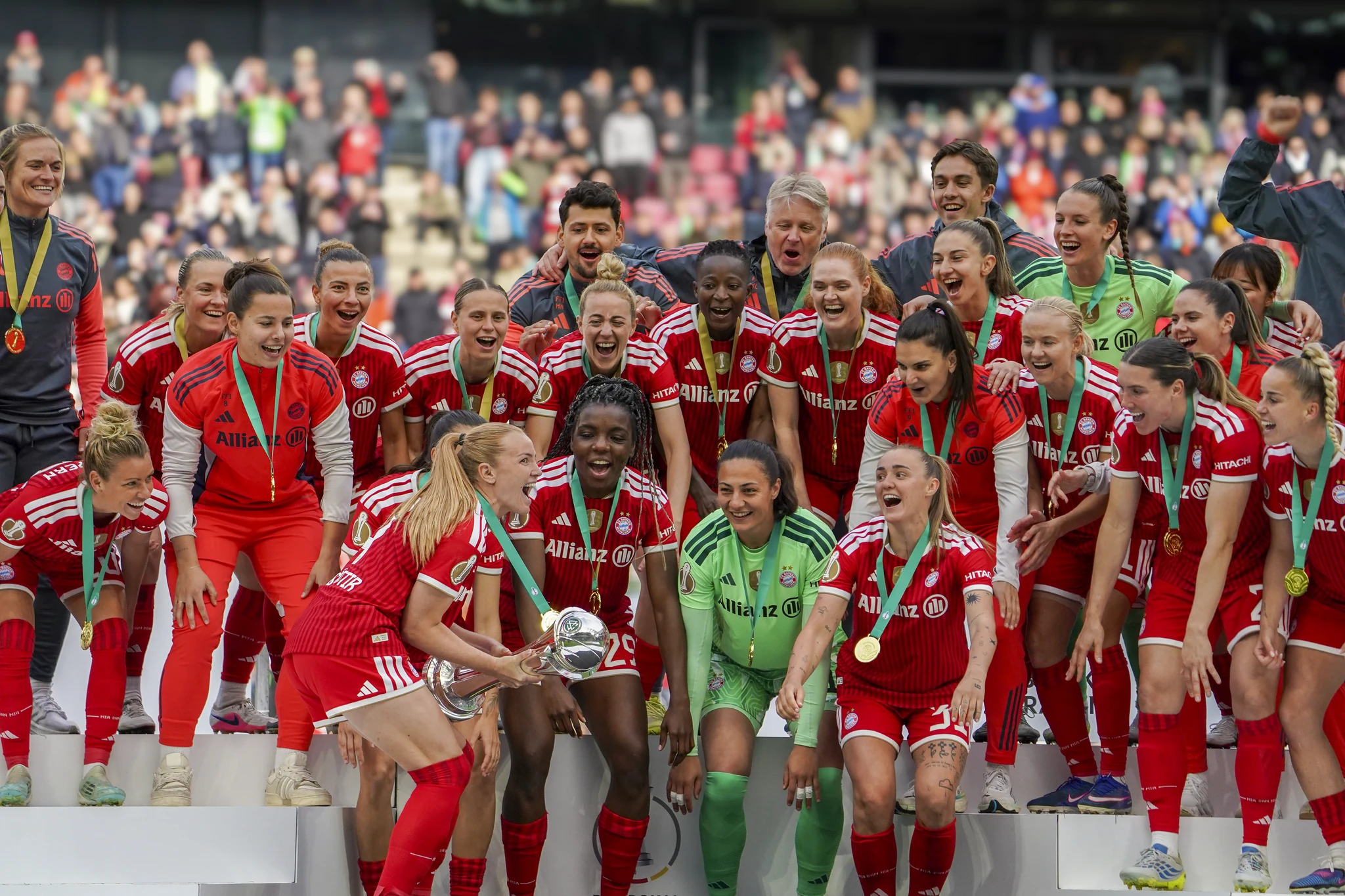Bayern Munich celebrate with the cup and confetti in Cologne.