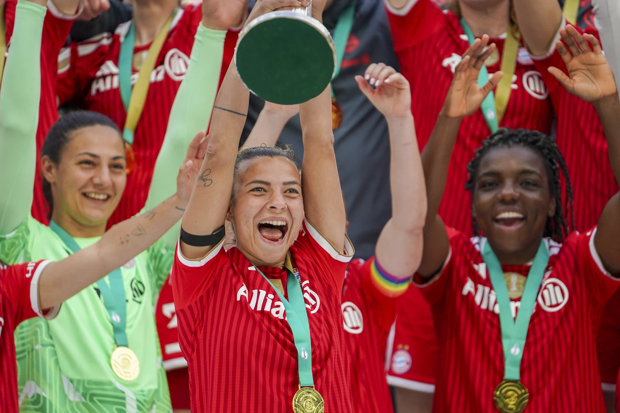 Bayern Munich celebrate with the cup and confetti in Cologne.