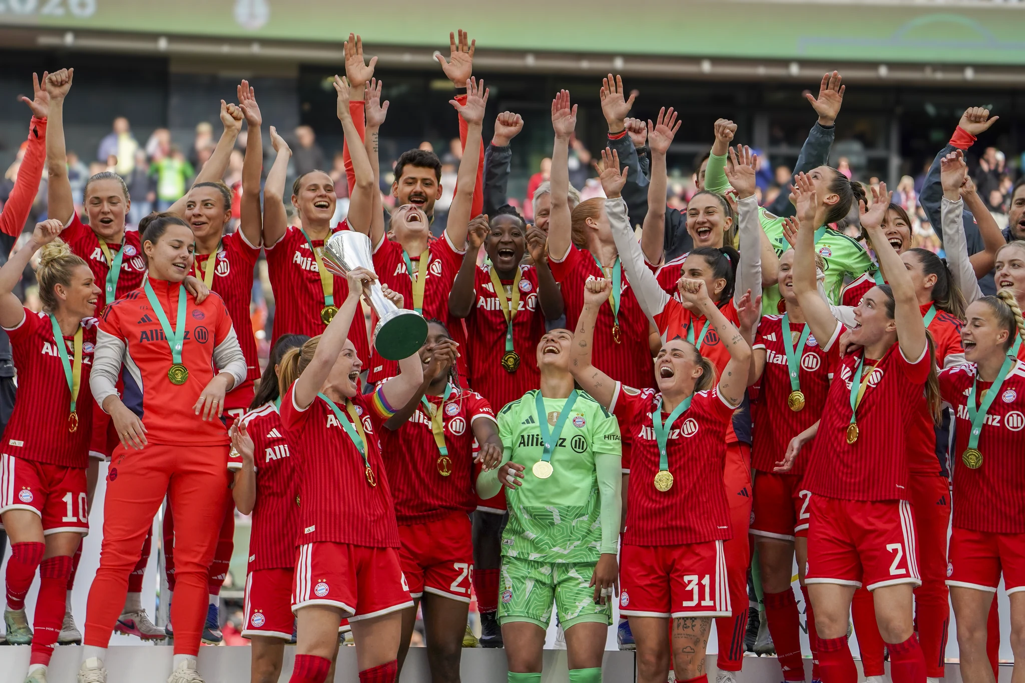 Bayern Munich celebrate with the cup and confetti in Cologne.