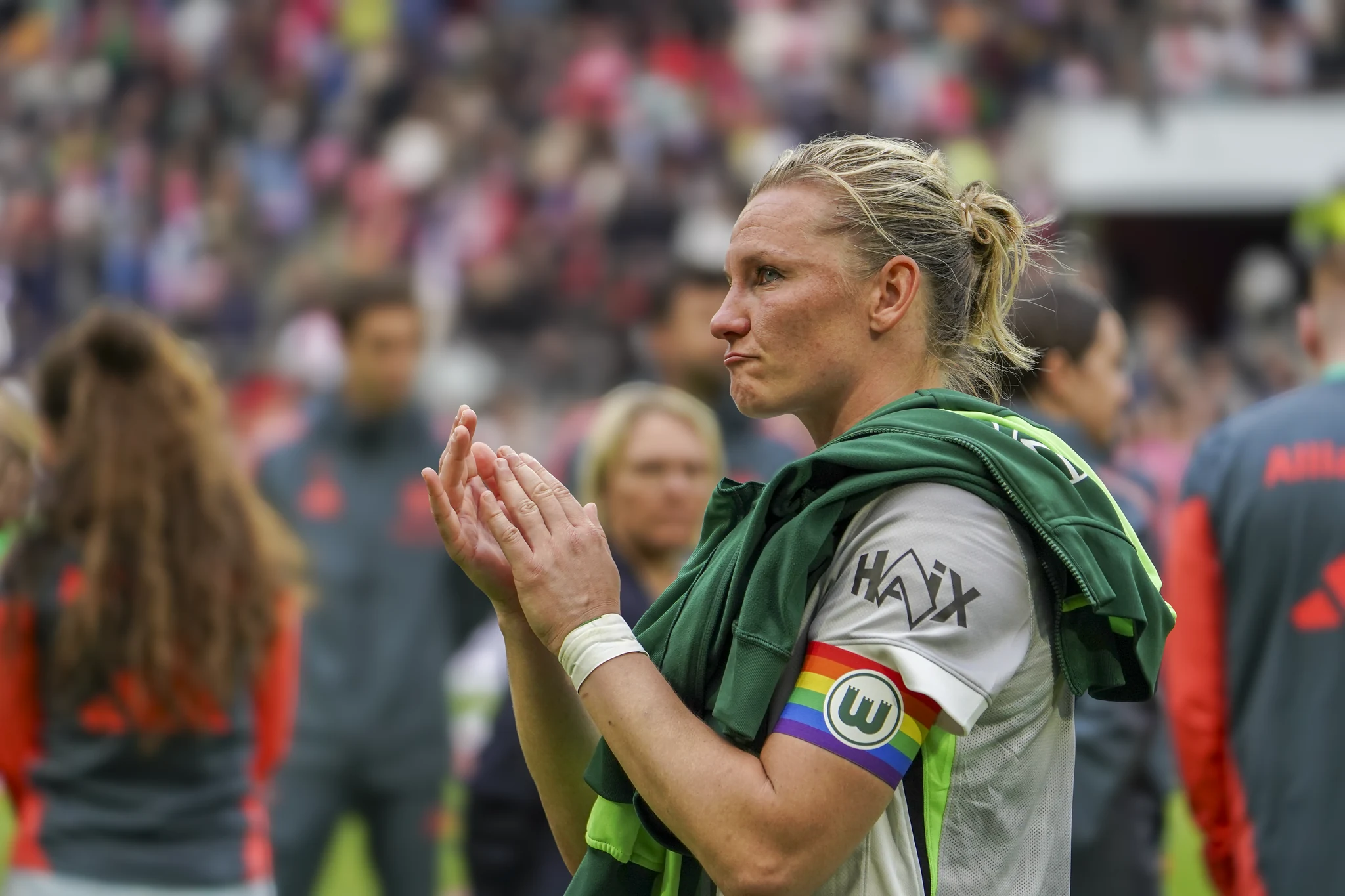 A Wolfsburg player applauds the supporters after the final.