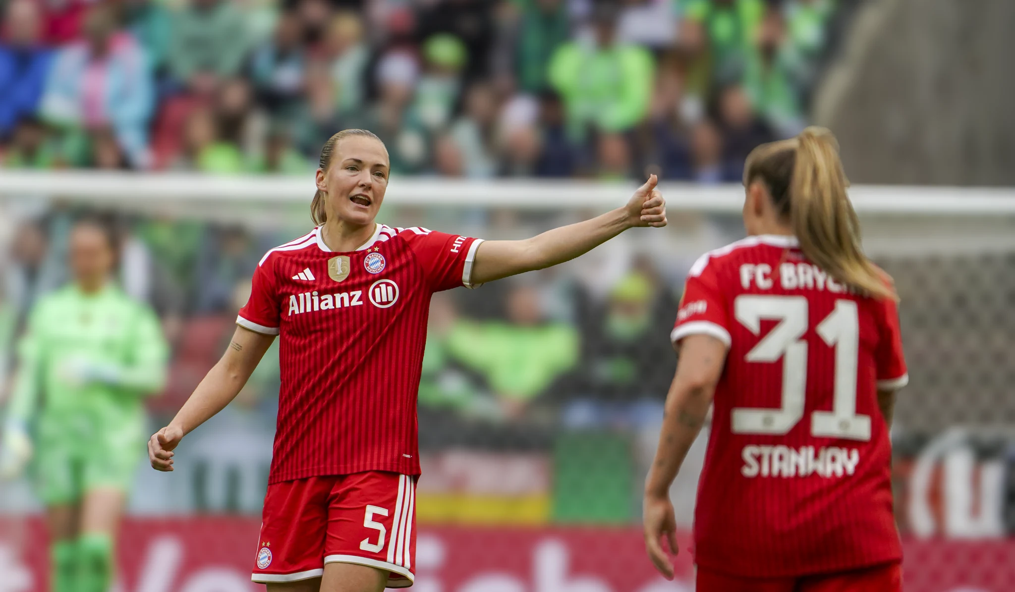 A Bayern Munich player gestures to her teammates during the final.